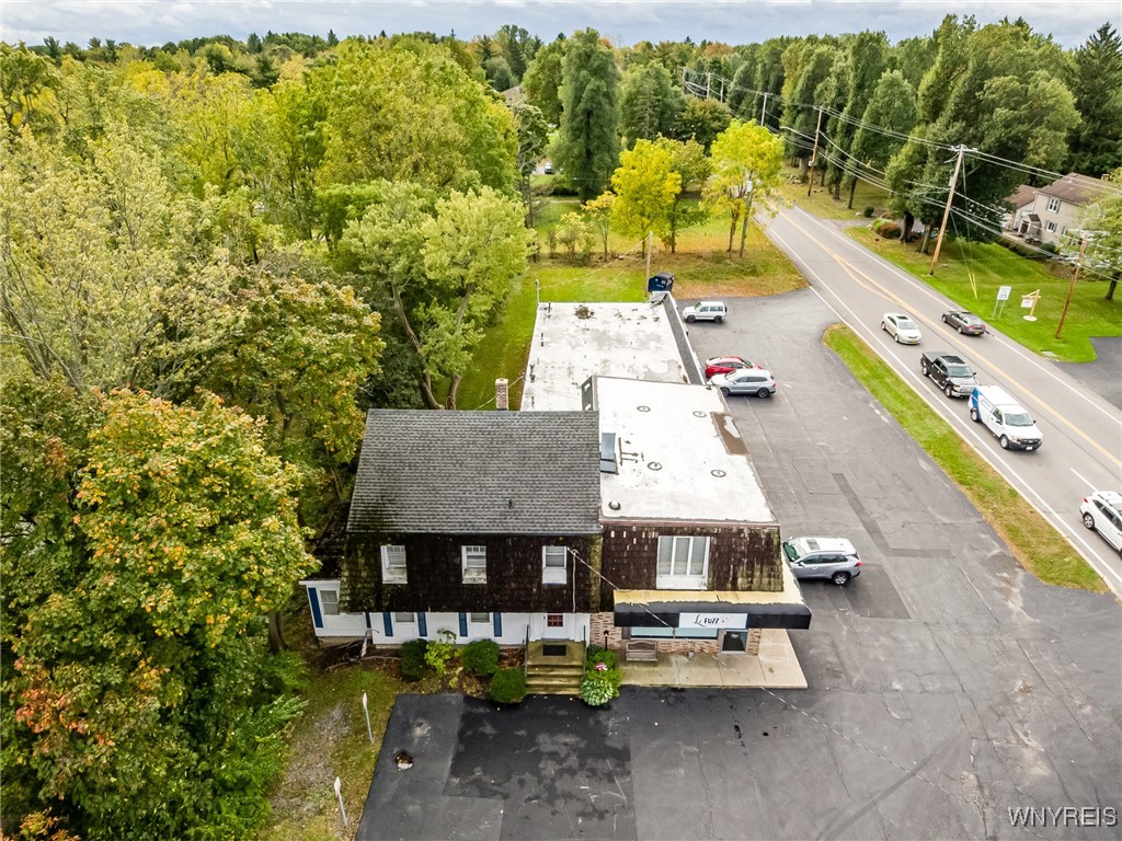 photo 5BMSE9KnFIMvwAHFN6vf2ZWeQ7O-j3vBq7k: 8511 Sheridan Drive, Clarence NY 14221