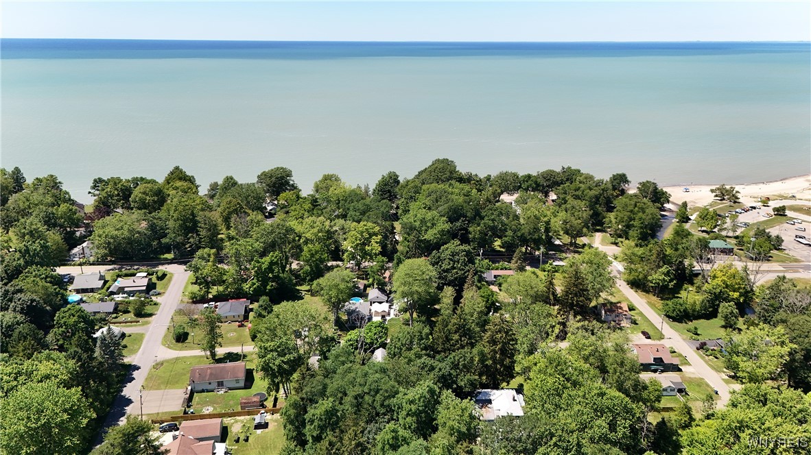 photo MpfKcrOBeTJMsRygj-u3FgdwaJnnM86iY: 9657 Court Street, Evans NY 14006
