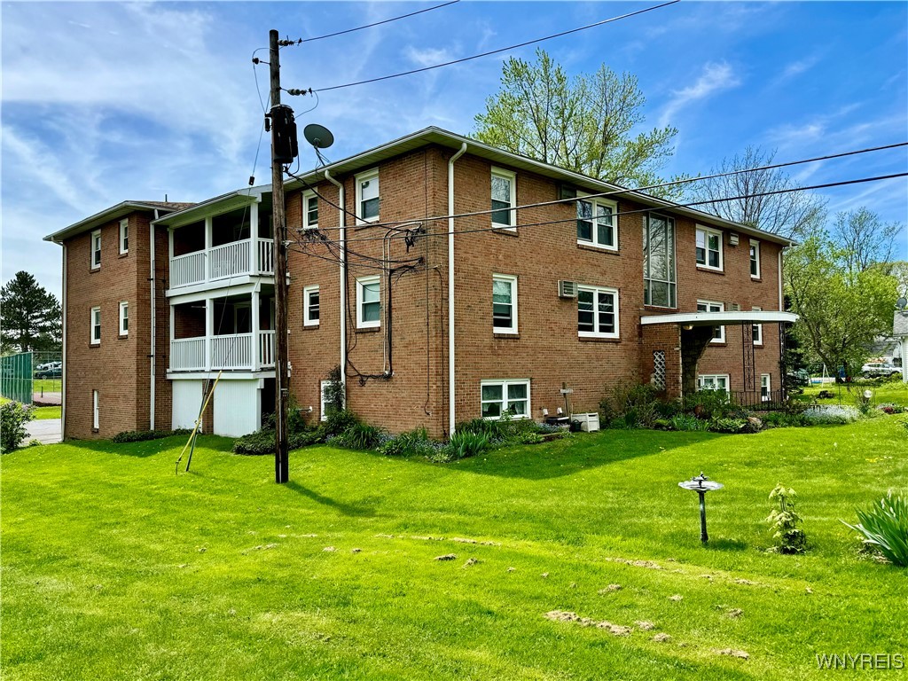 photo 0: 6321 West Quaker Street 9, Orchard Park NY 14127