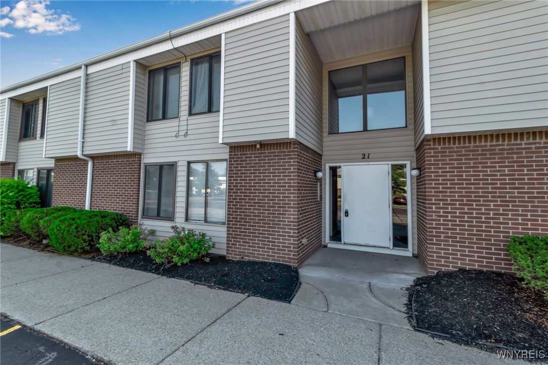 photo 0: 21 Coolbrook Court A, Amherst NY 14051